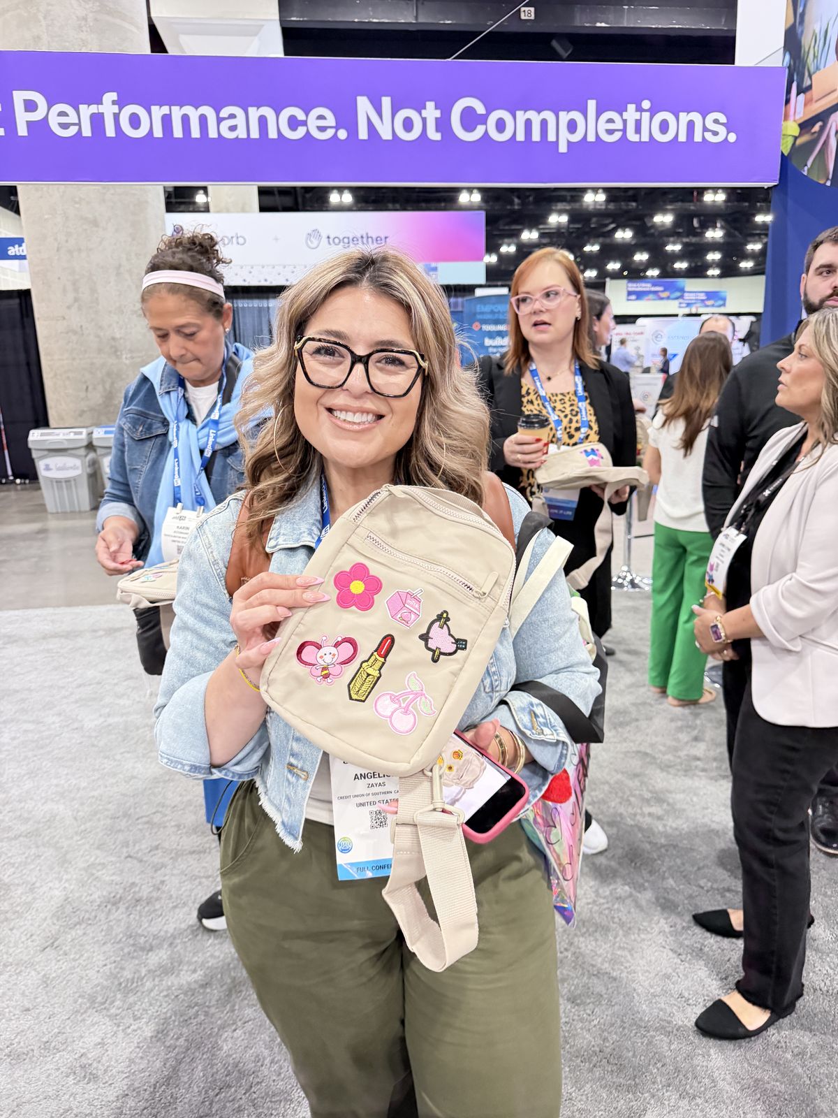 Live merch booth drawing a line at an Anaheim trade show