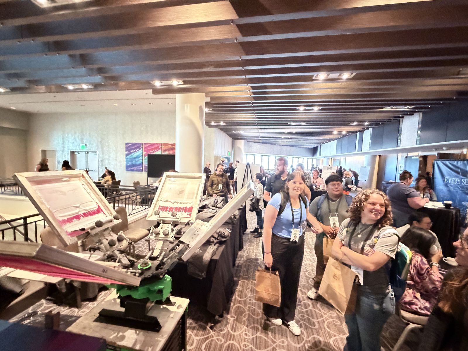 Merch Troop live screen-printing station running at a Anaheim event